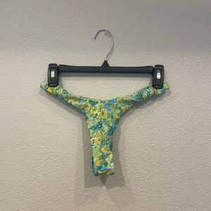 Green and yellow tropical print thong bikini bottoms
